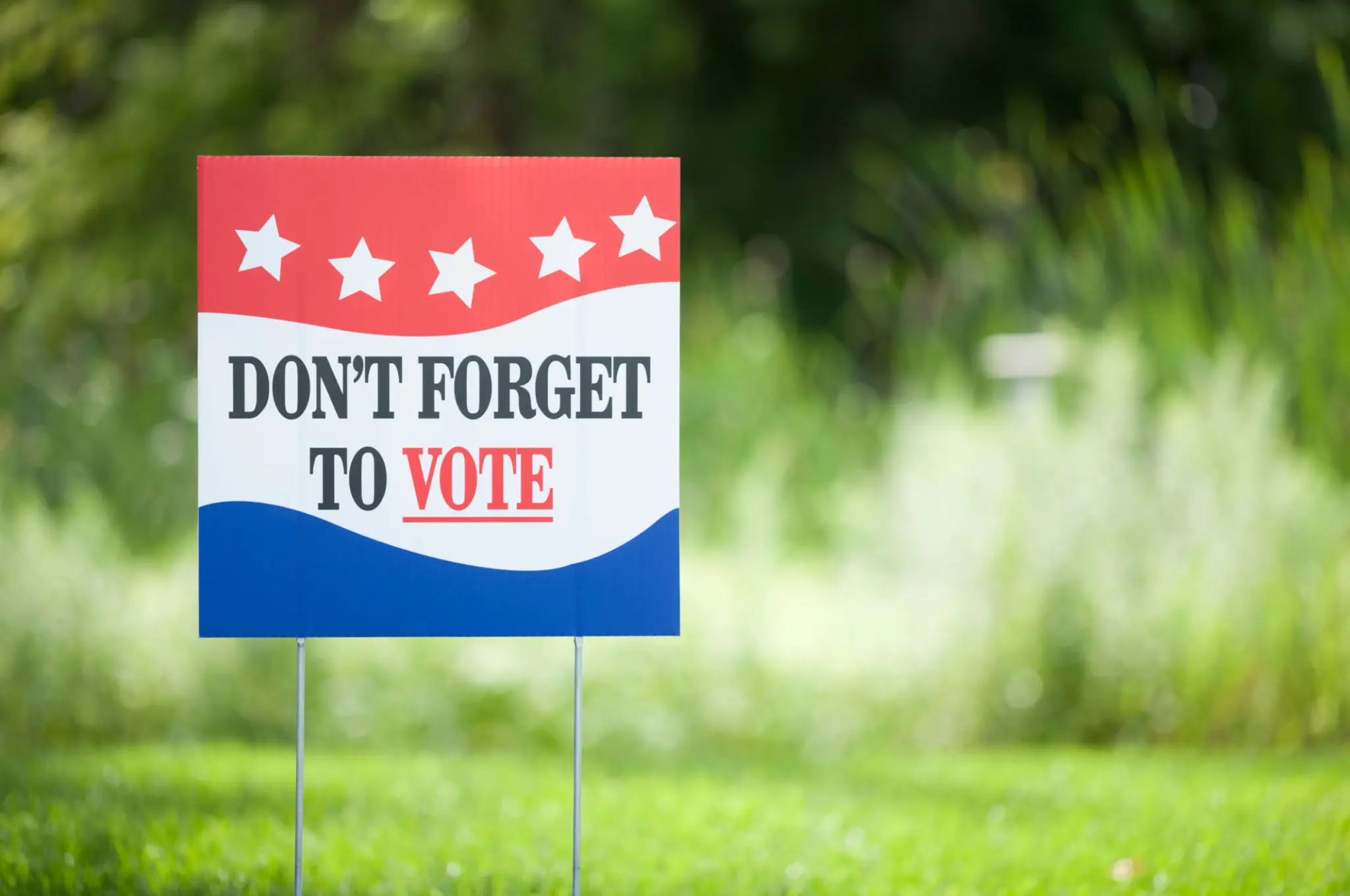 Red white blue Don't forget to vote sign